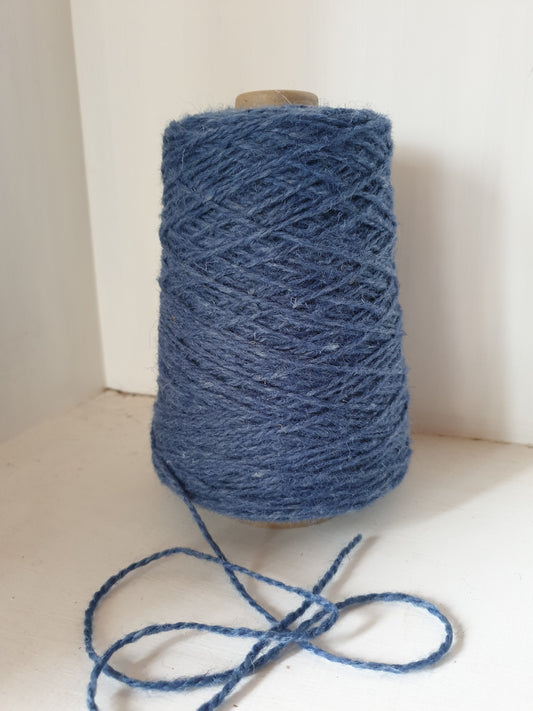 A medium blue rug yarn