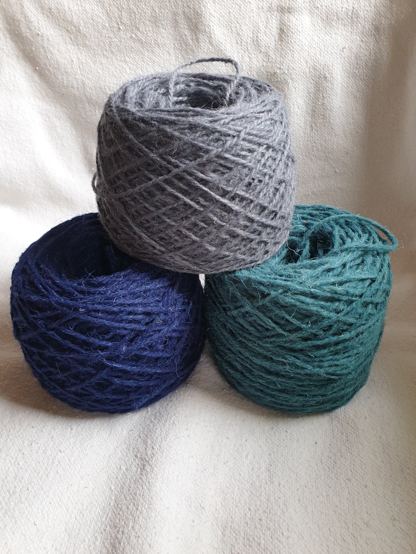 £ balls of rug yarn - Bue biro, Blue grey and Blue Atlantic sea