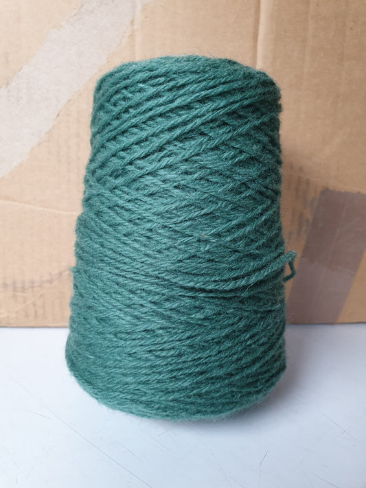 A chalky sea green Axminster rug yarn