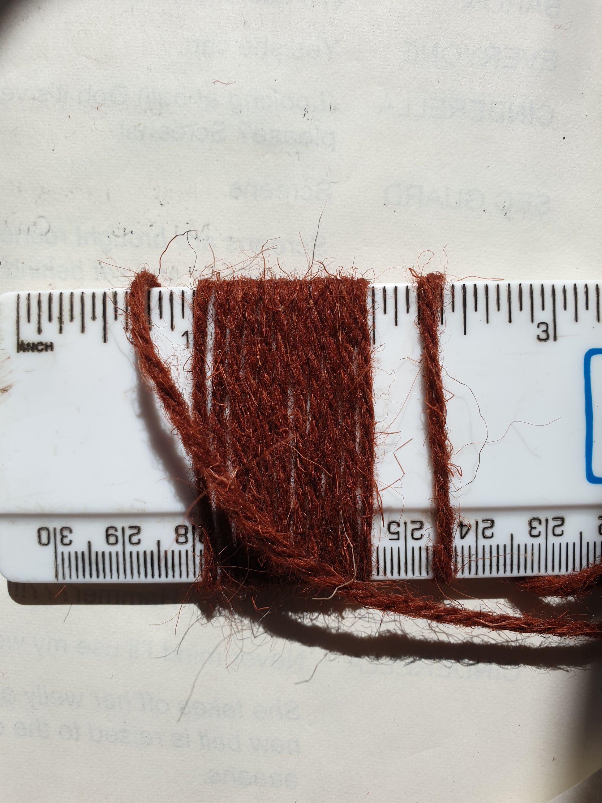 Conker brown rug yarn showing thickness