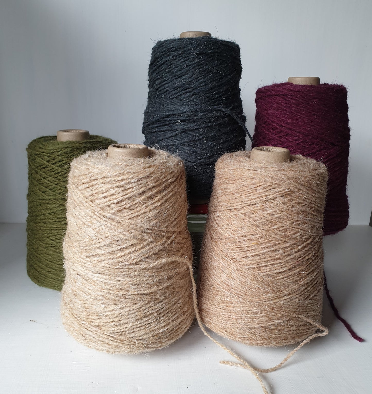 2 fawn rug yarns with 3 other colours