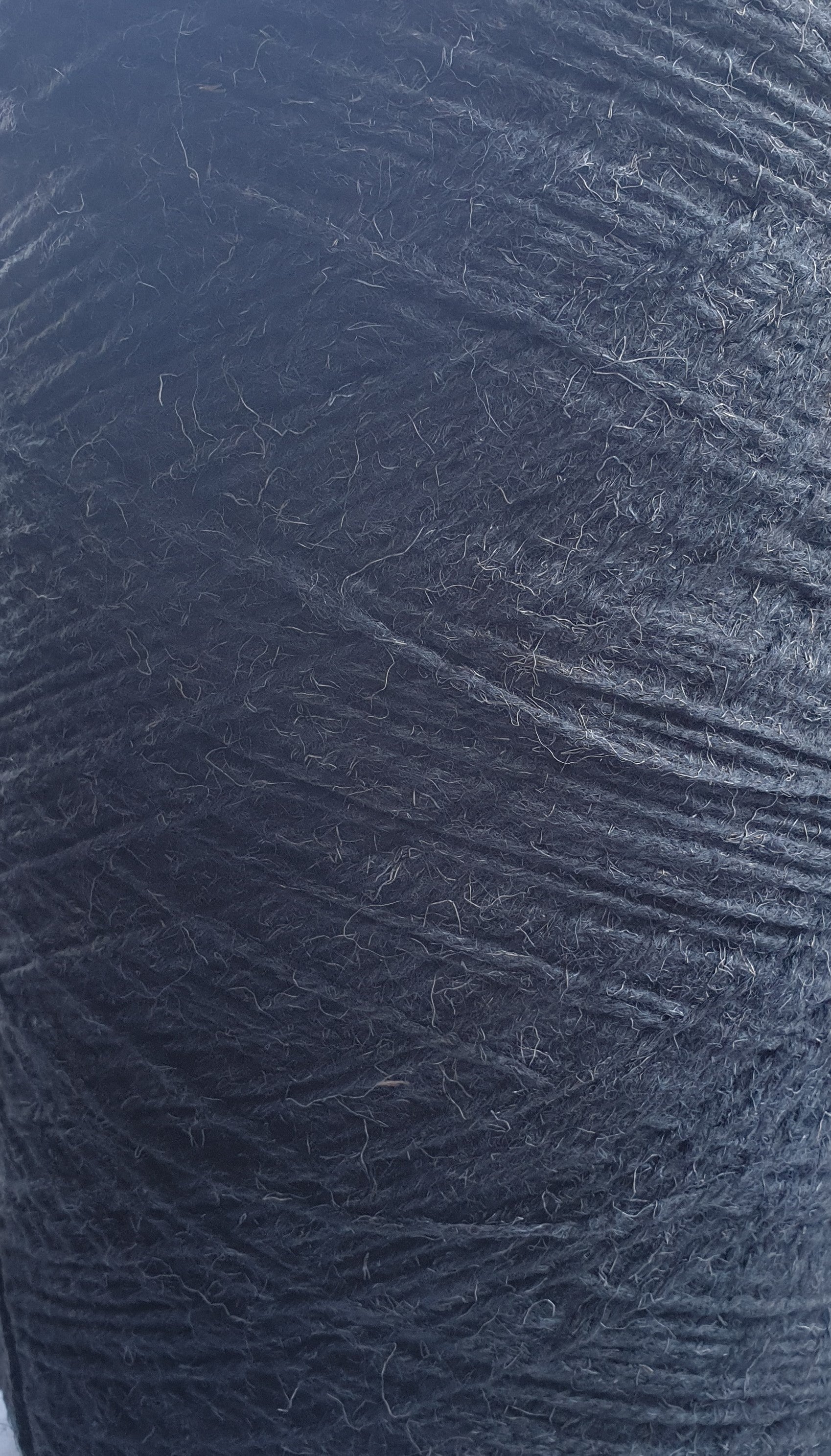 Close up of grey slate rug yarn