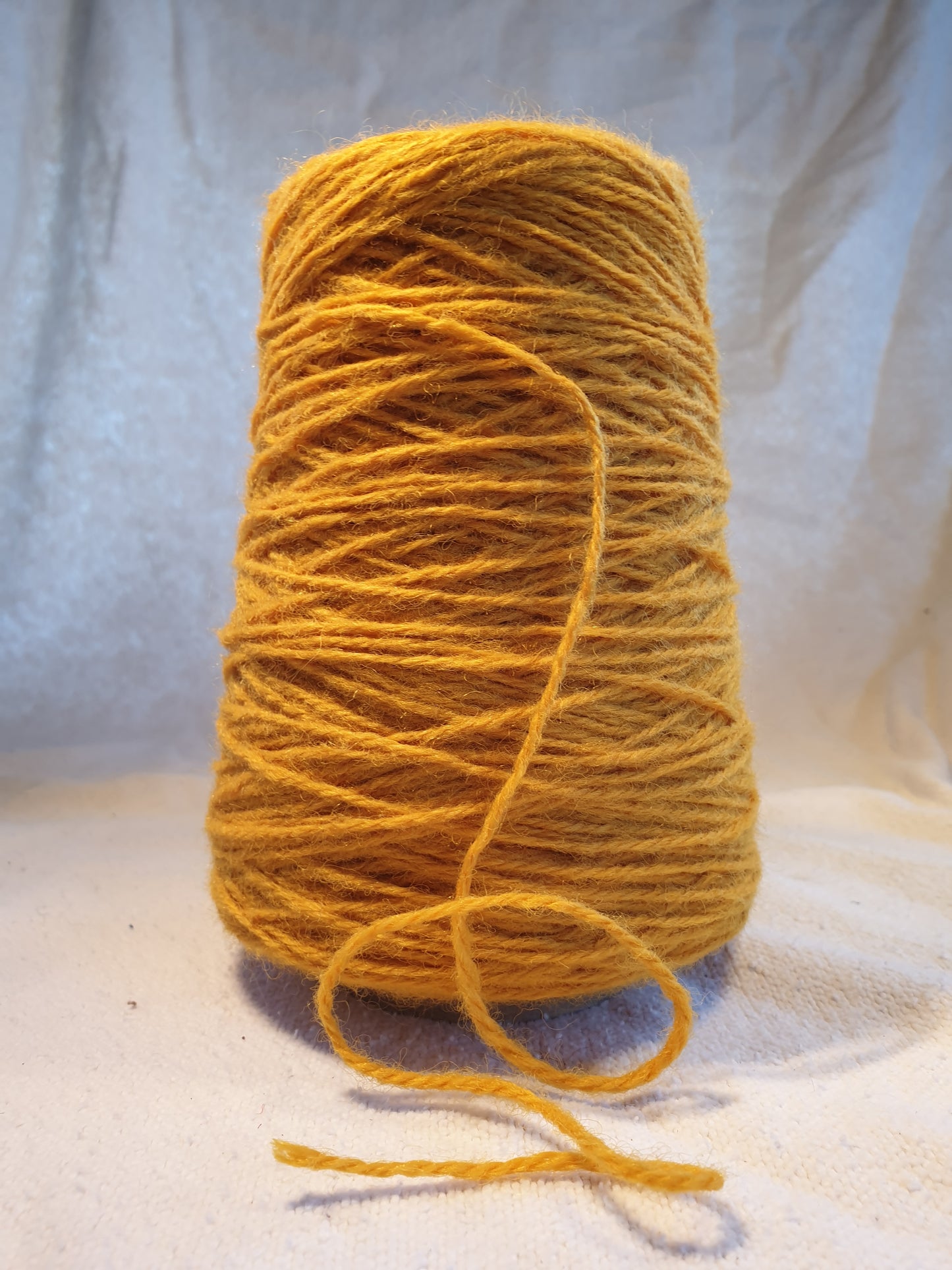 A Cone of Corn Yellow Golden Rug Yarn