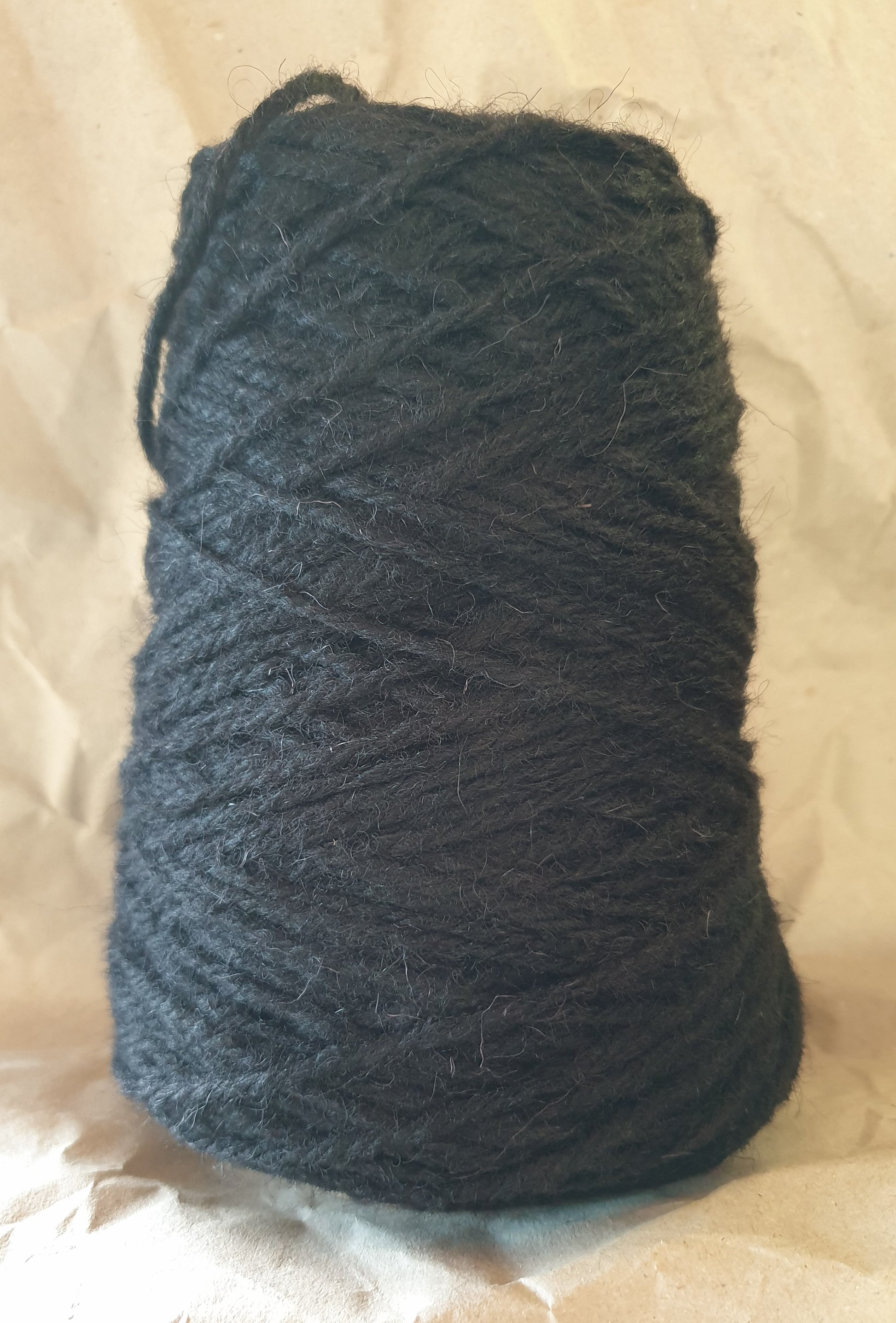 250g cone of black wool and nylon yarn