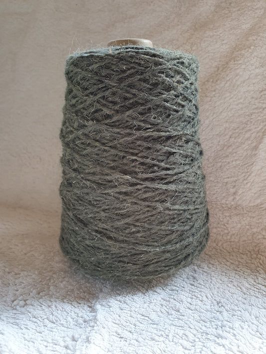 A 250g cone of dull green marram grass coloured rug wool