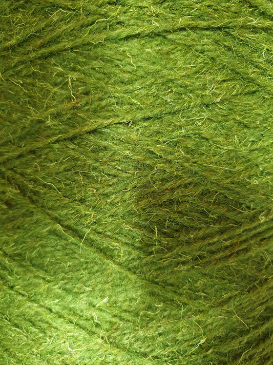 A large cone of moss-green rug wool