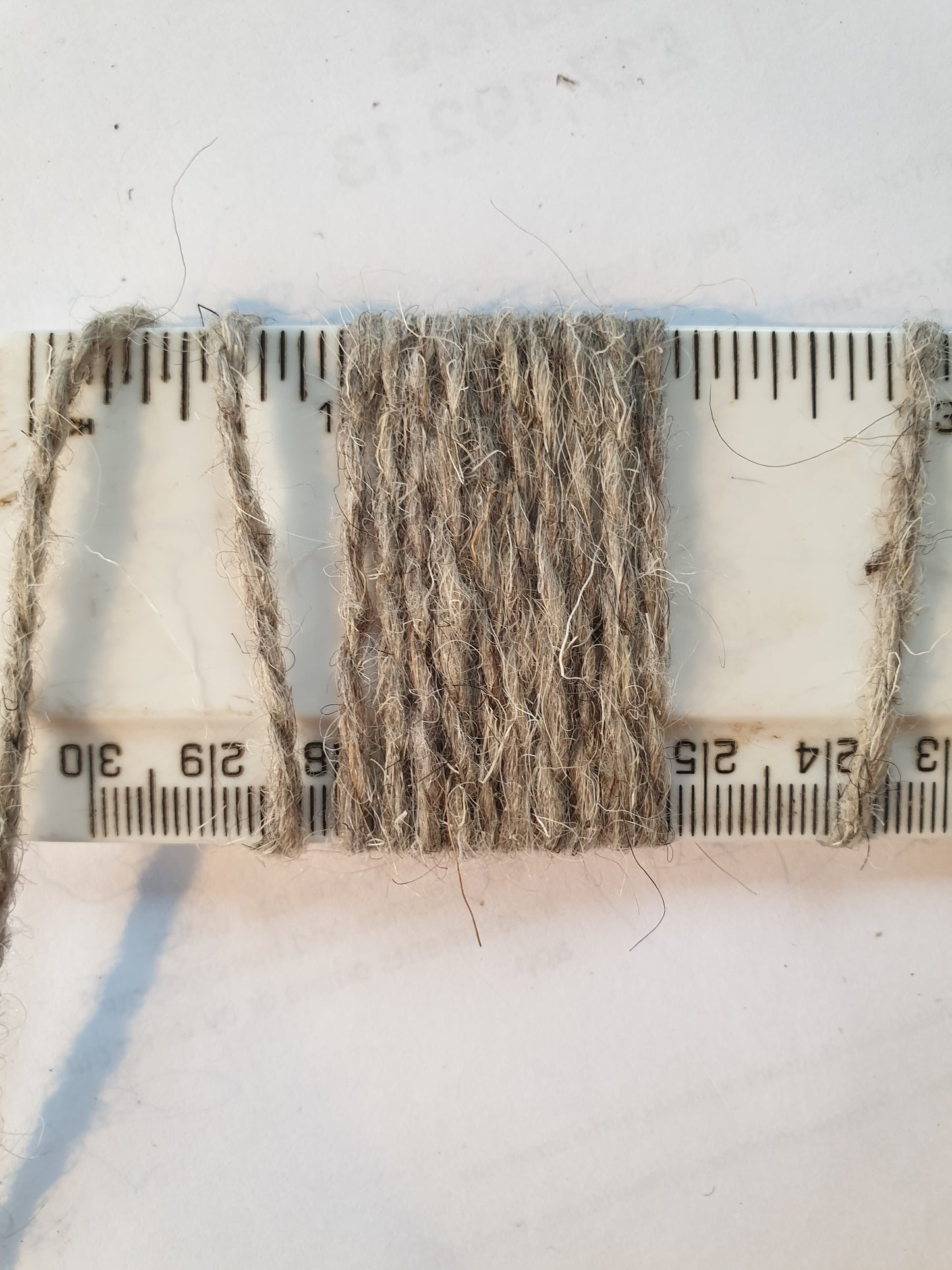 Light Grey rug yarn showing 10 wpi