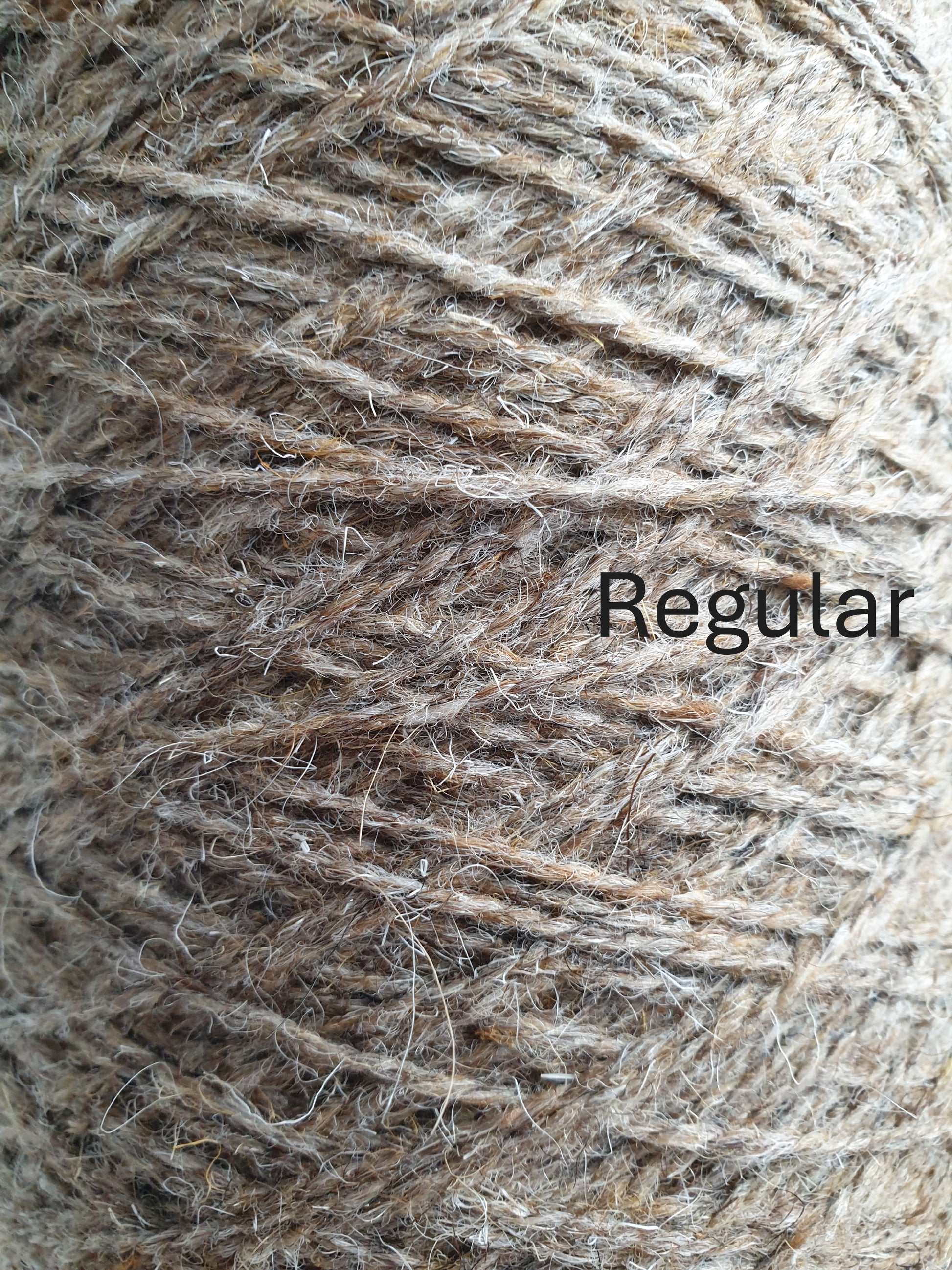 close up of regular fawn tweed rug yarn